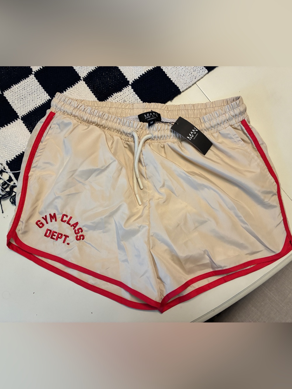 Boohoo beige athletic shorts with red trim